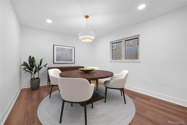 5730 E 19th Ave, Denver, CO 80220 - dining area featuring wood finished floors, baseboards, and recessed lighting