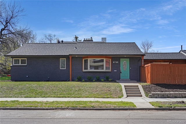 5730 E 19th Ave, Denver, CO 80220 - view of front of property featuring brick siding and a shingled roof