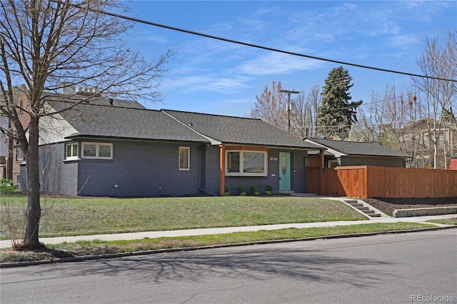 5730 E 19th Ave, Denver, CO 80220 - single story home with a shingled roof and brick siding