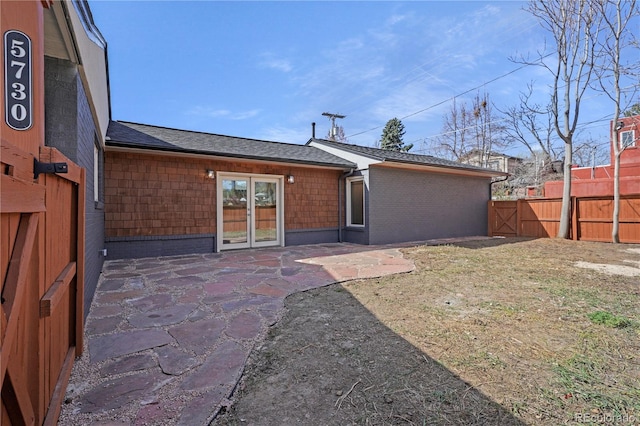 5730 E 19th Ave, Denver, CO 80220 - rear view of property with fence and a patio area