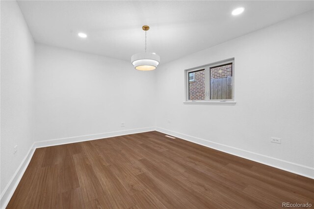 5730 E 19th Ave, Denver, CO 80220 - spare room with baseboards, dark wood finished floors, and recessed lighting