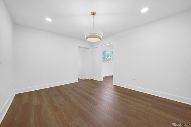5730 E 19th Ave, Denver, CO 80220 - empty room featuring dark wood-style flooring, baseboards, and recessed lighting