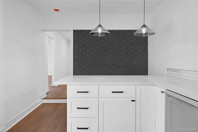 5730 E 19th Ave, Denver, CO 80220 - kitchen with dishwasher, white cabinets, dark wood-type flooring, and light countertops