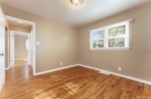 empty room featuring light hardwood / wood-style floors