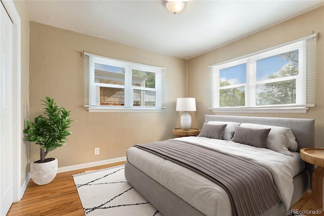 bedroom featuring hardwood / wood-style floors