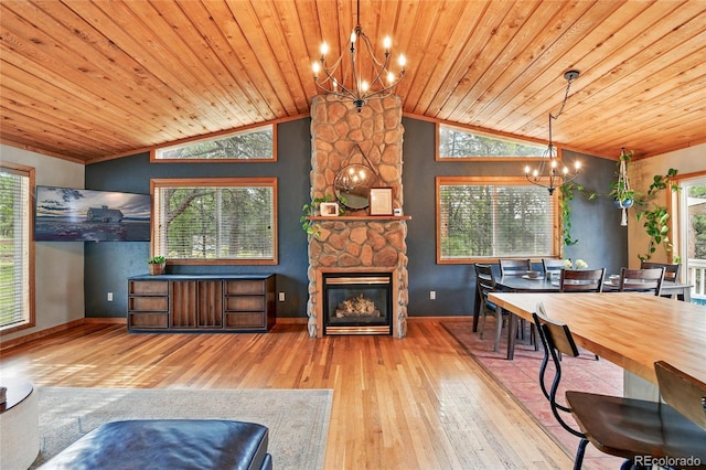 294 Kudu Trl, Bailey, CO 80421 - living room with a chandelier, lofted ceiling, wooden ceiling, hardwood / wood-style floors, and plenty of natural light