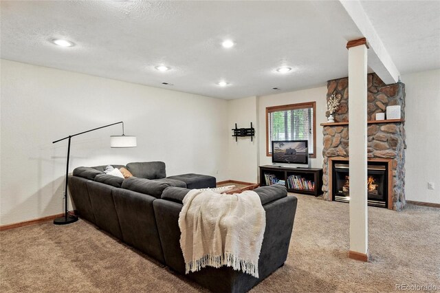 294 Kudu Trl, Bailey, CO 80421 - living area featuring carpet flooring, baseboards, a fireplace, recessed lighting, and a textured ceiling