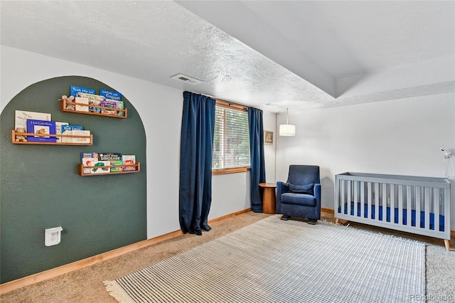 294 Kudu Trl, Bailey, CO 80421 - bedroom with carpet floors, baseboards, and a textured ceiling