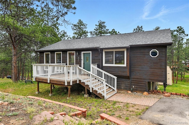 294 Kudu Trl, Bailey, CO 80421 - view of front of home with a shingled roof and a deck