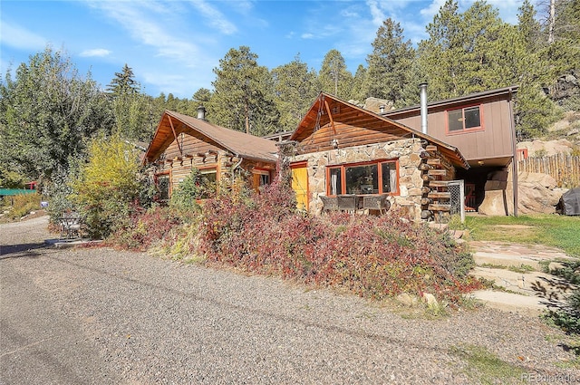 view of log cabin