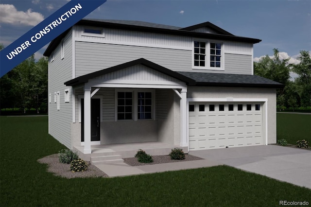 view of front of home with a garage and a front yard