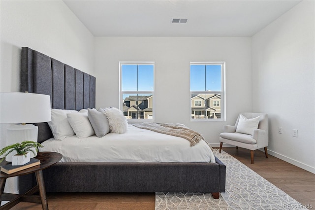 bedroom featuring wood-type flooring