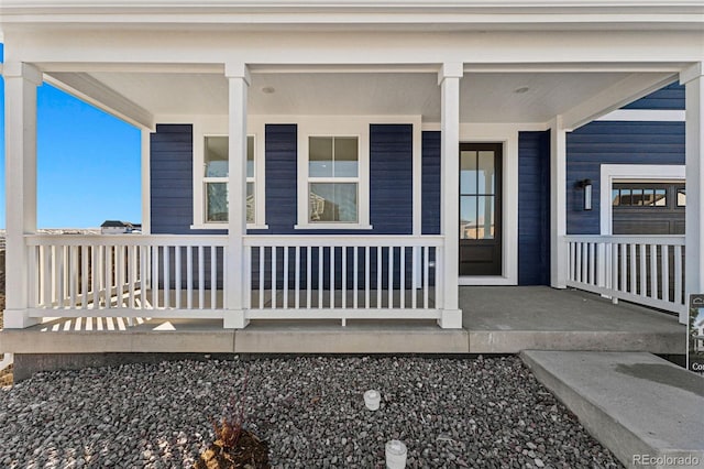 doorway to property with a porch