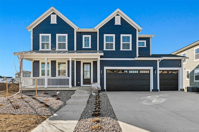 view of front of property with a porch, a garage, and central air condition unit