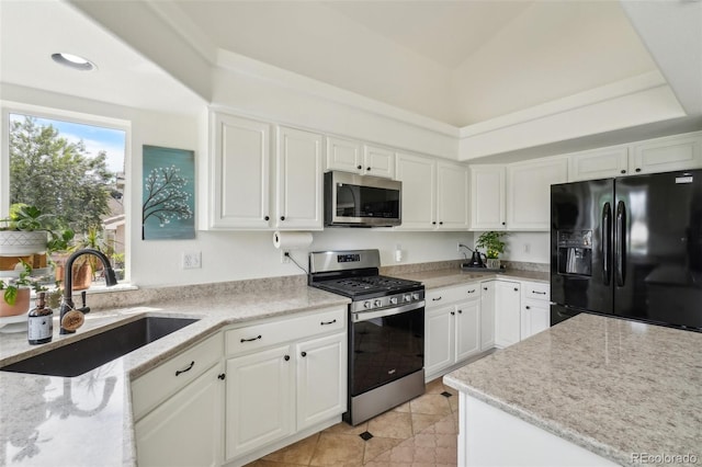 4520 Maroon Cir, Broomfield, CO 80023 - kitchen with stainless steel appliances, a sink, and white cabinetry