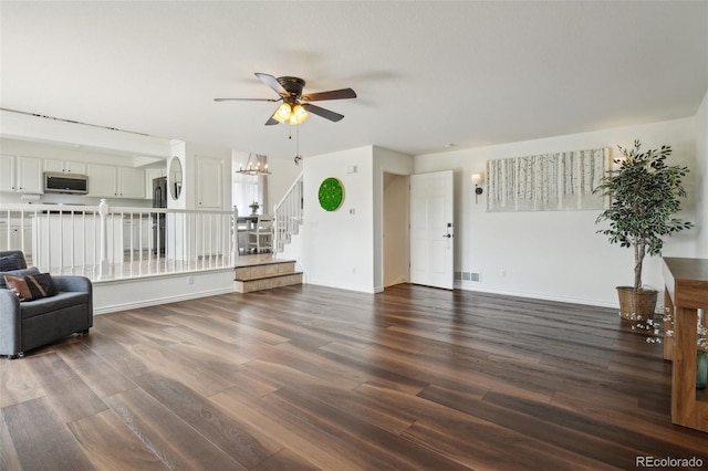 4520 Maroon Cir, Broomfield, CO 80023 - living room featuring stairway, a ceiling fan, wood finished floors, and baseboards