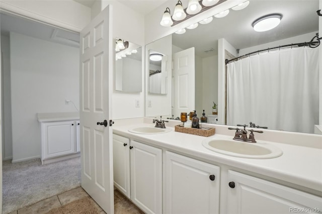 4520 Maroon Cir, Broomfield, CO 80023 - bathroom with double vanity and tile patterned floors