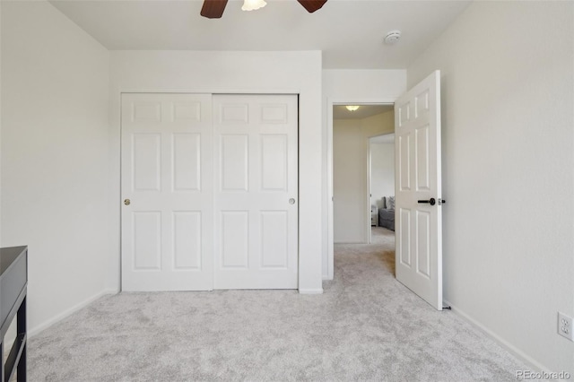 4520 Maroon Cir, Broomfield, CO 80023 - unfurnished bedroom featuring carpet flooring, a closet, baseboards, and ceiling fan