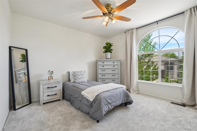 4520 Maroon Cir, Broomfield, CO 80023 - bedroom featuring light colored carpet, baseboards, and a ceiling fan
