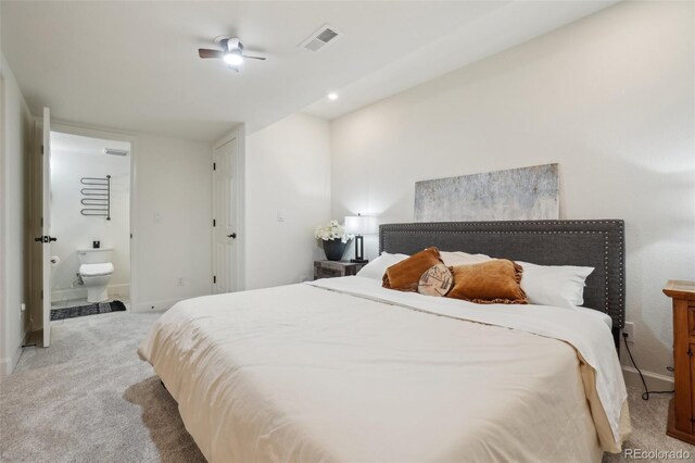 4520 Maroon Cir, Broomfield, CO 80023 - bedroom with light colored carpet, baseboards, and ensuite bath