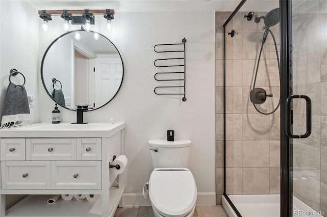 4520 Maroon Cir, Broomfield, CO 80023 - bathroom featuring a stall shower, baseboards, toilet, and vanity