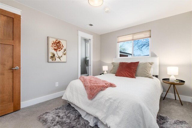 5743 Field St, Arvada, CO 80002 - carpeted bedroom featuring baseboards