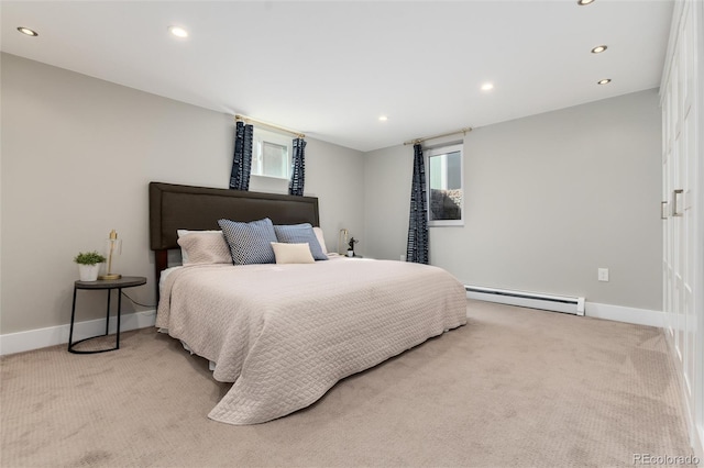 5743 Field St, Arvada, CO 80002 - bedroom with baseboard heating, light carpet, recessed lighting, and baseboards