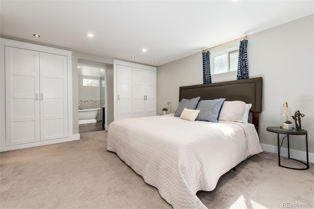 5743 Field St, Arvada, CO 80002 - bedroom with light colored carpet, recessed lighting, ensuite bath, and baseboards