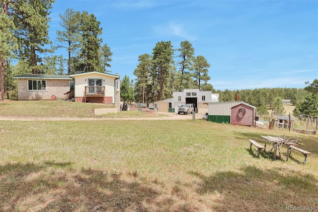 10771 Winding Meadow Dr, Kiowa, CO 80117 - view of yard featuring an outbuilding