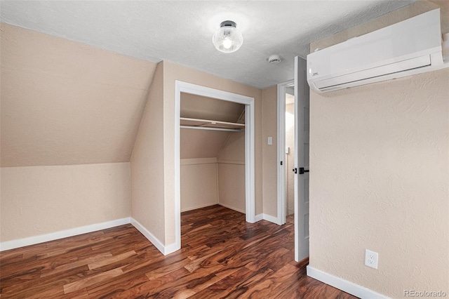 closet with a wall mounted AC