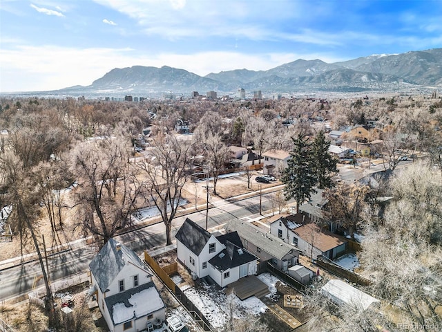 drone / aerial view featuring a residential view and a mountain view