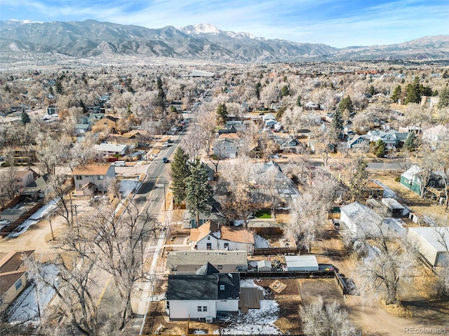 drone / aerial view featuring a residential view and a mountain view