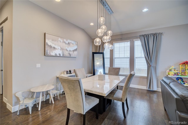 dining room featuring lofted ceiling, baseboards, dark wood-style flooring, and recessed lighting