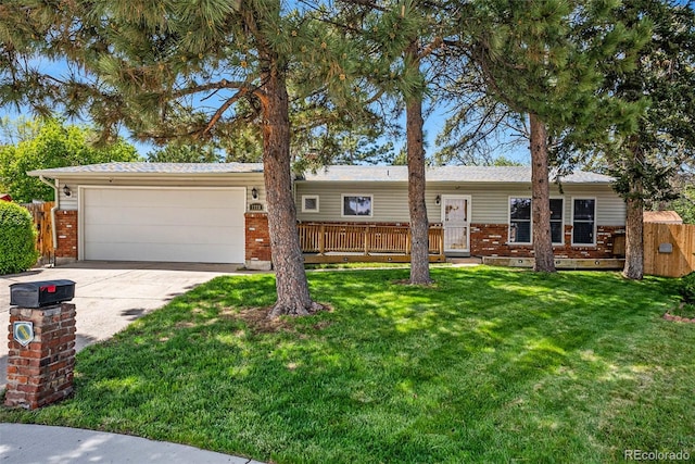 7773 Brentwood Ct, Arvada, CO 80005 - single story home with a garage, brick siding, and driveway