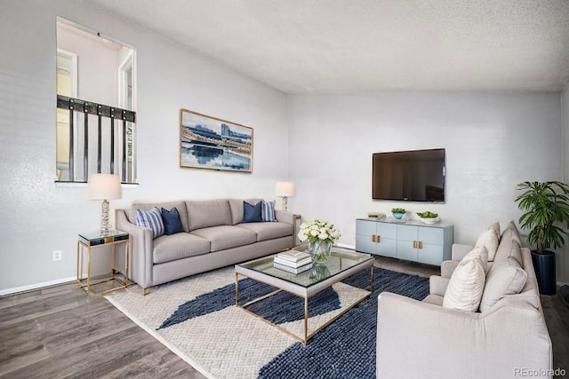 7773 Brentwood Ct, Arvada, CO 80005 - living room featuring wood finished floors and baseboards
