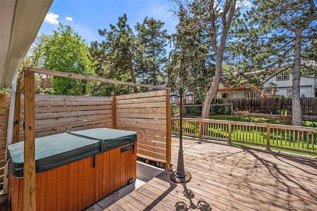 7773 Brentwood Ct, Arvada, CO 80005 - wooden terrace featuring a hot tub and fence