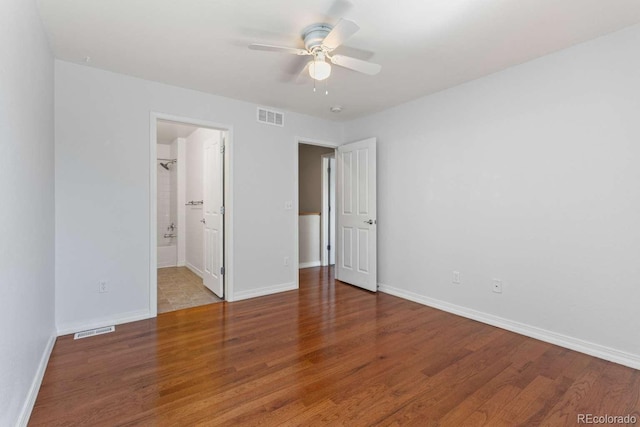 13231 Holly St Unit B, Thornton, CO 80241 - unfurnished bedroom featuring wood finished floors and a ceiling fan