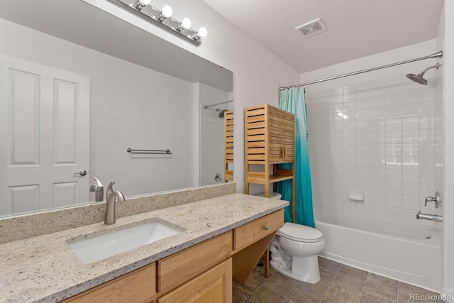 13231 Holly St Unit B, Thornton, CO 80241 - bathroom featuring shower / bath combo with shower curtain, vanity, and tile patterned floors