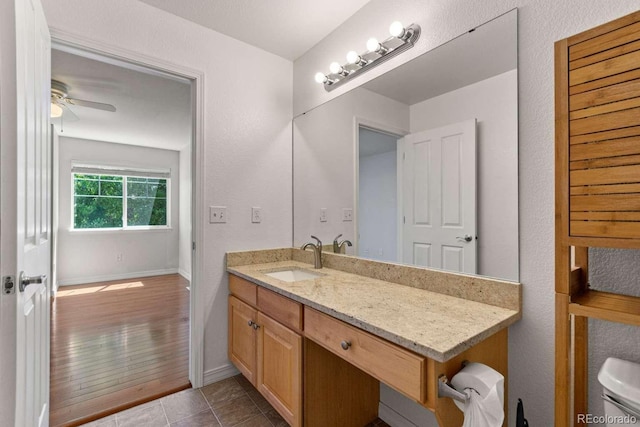 13231 Holly St Unit B, Thornton, CO 80241 - bathroom featuring vanity and ceiling fan