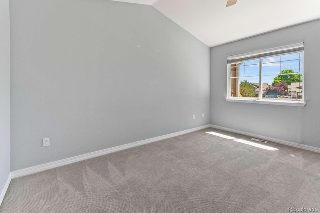 13231 Holly St Unit B, Thornton, CO 80241 - unfurnished room with lofted ceiling, carpet, and ceiling fan