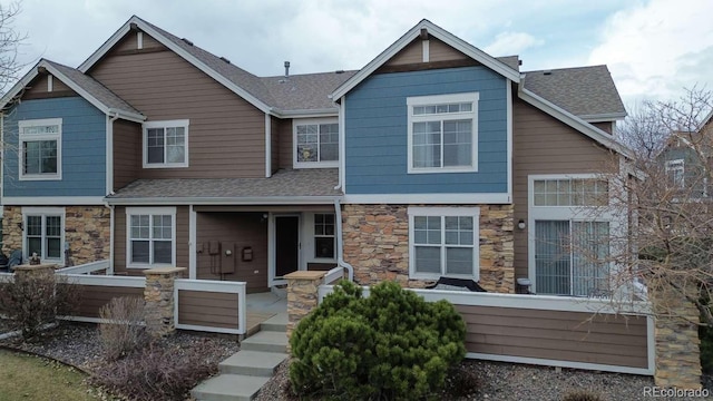 13231 Holly St Unit B, Thornton, CO 80241 - craftsman-style house with stone siding and roof with shingles