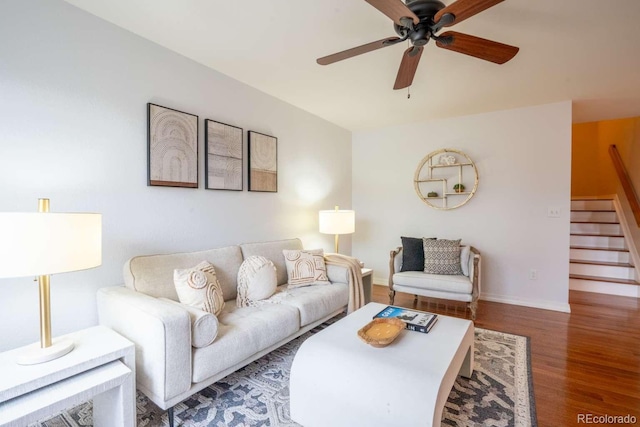 13231 Holly St Unit B, Thornton, CO 80241 - living area with ceiling fan, wood finished floors, and stairs
