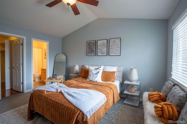 13231 Holly St Unit B, Thornton, CO 80241 - carpeted bedroom with vaulted ceiling, a ceiling fan, and ensuite bathroom