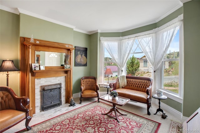 220 E Eaton Ave, Cripple Creek, CO 80813 - living area featuring baseboards, plenty of natural light, a fireplace, ornamental molding, and carpet flooring