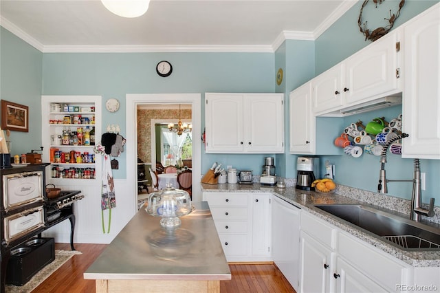 220 E Eaton Ave, Cripple Creek, CO 80813 - kitchen featuring white dishwasher, a sink, a chandelier, light wood-style flooring, and white cabinets