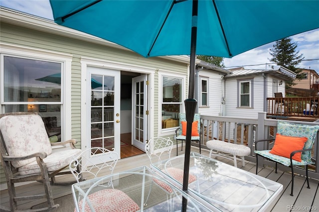 220 E Eaton Ave, Cripple Creek, CO 80813 - wooden terrace with outdoor dining area