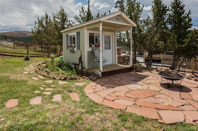 220 E Eaton Ave, Cripple Creek, CO 80813 - view of outdoor structure featuring a fire pit