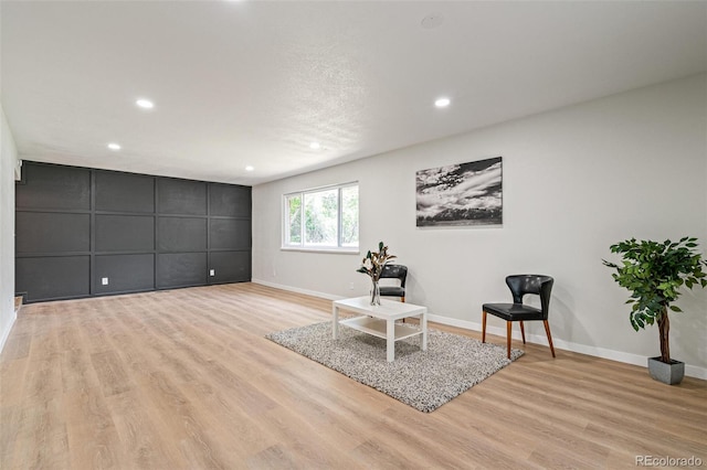 423 Nile St, Aurora, CO 80010 - sitting room featuring light wood finished floors, recessed lighting, and baseboards