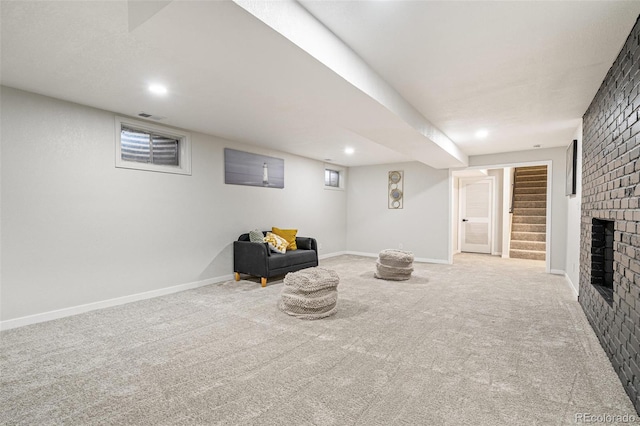 423 Nile St, Aurora, CO 80010 - living area featuring carpet floors, recessed lighting, a fireplace, stairs, and baseboards