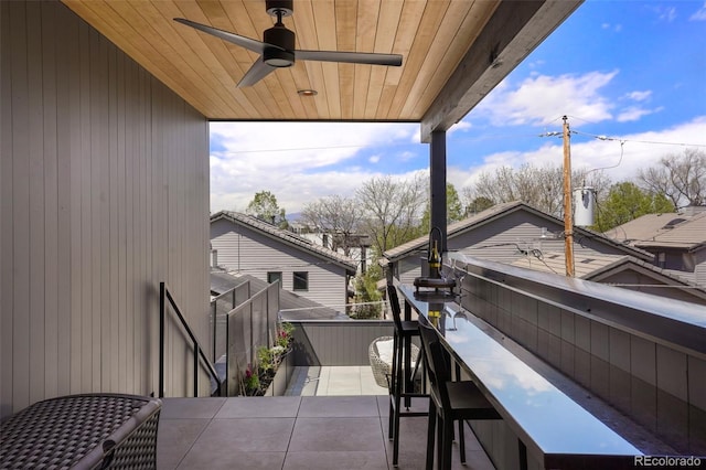 balcony featuring ceiling fan